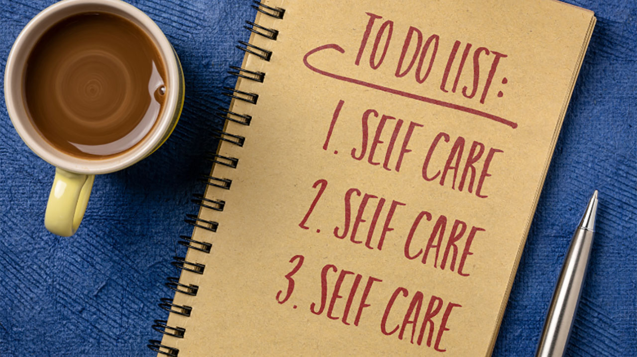 Image of notebook with to do list that says "self care"